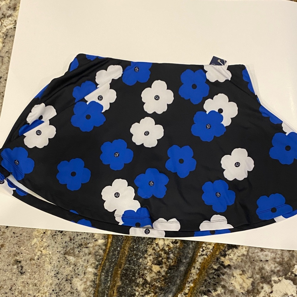 Original Penguin Ladies skort, size small, color Black w/white and blue print.